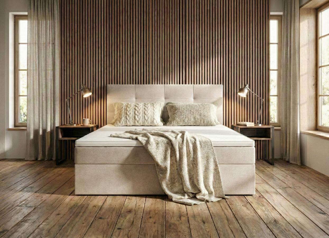 Beżowe łóżko Sega frontalnie w loft aranżacji