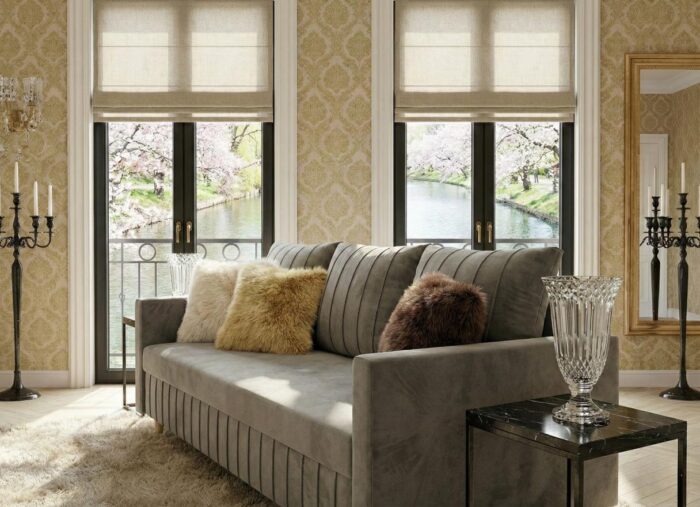 Ujęcie bokiem w eleganckim salonie szara sofa rozkładana 224 cm Watson